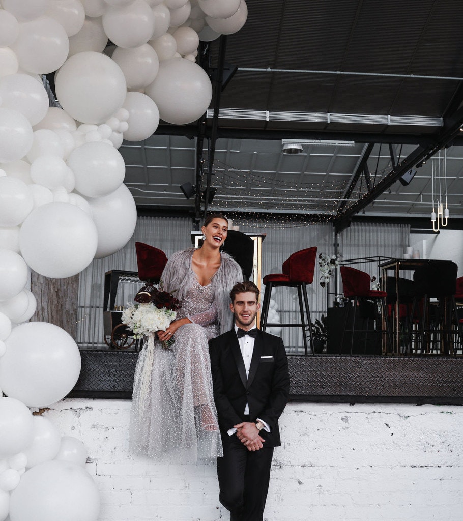 Wedding couple outside The Wool Mill.